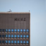 gray building showing 13:14